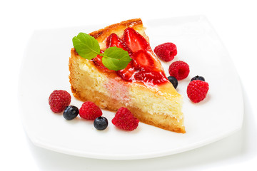 cake on plate isolated on white background