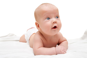 Curious baby boy in a diaper