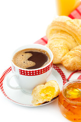 Continental breakfast with croissants, marmalade and coffee