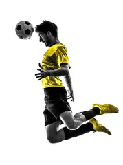 Foto auf Acrylglas brazilian soccer football player young man heading silhouette © snaptitude