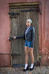 Attractive woman with hairband posing and looking at camera