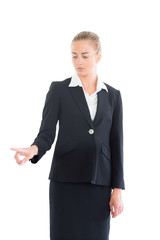 Young business woman pointing