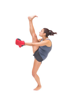 Pretty sporty brunette kick boxing
