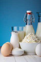 Dairy products on wooden table close-up