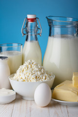 Dairy products on wooden table close-up