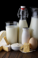 Dairy products on wooden table close-up