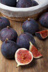Ripe figs on wooden table