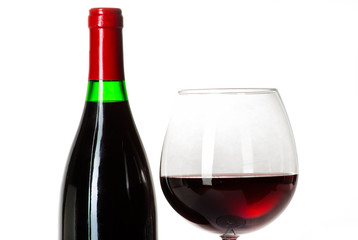 Wine bottle and a glass filled with wine isolated on white