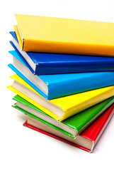 Colorful real books on white background