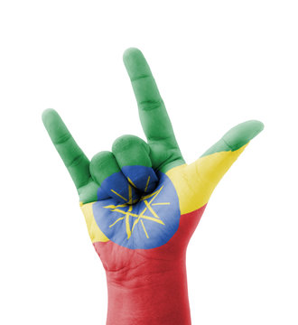 Hand making I love you sign, Ethiopia flag painted