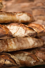 close-up on well baked baguette breads at the bakery