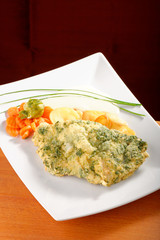 Pork chop with spices, potatoes and vegetables