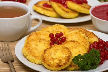 Sweet cheese pancakes on a plate