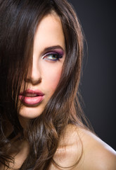 Fototapeta premium Portrait of beautiful girl with brilliant pink make-up