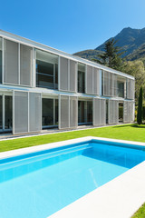 Modern house with pool, view from the garden