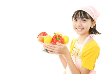 野菜を持つ女の子