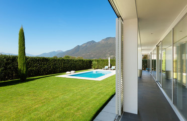 Modern villa with pool, view from the porch