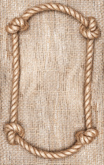 Rope frame and burlap background