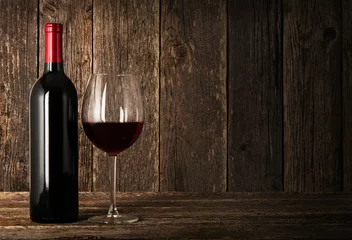 Küchenrückwand glas motiv Wein Bottle of red wine and glass