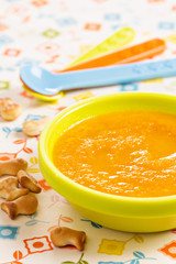 Carrot soup for children with crackers