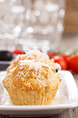 Savoury muffins with parmesan cheese and olives