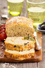 Savoury loaf cake with tomatoes, cheese and olives