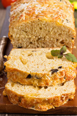 Savoury loaf cake with cheese and olives