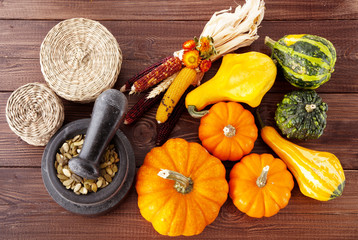 Fresh pumpkins on a wooden table