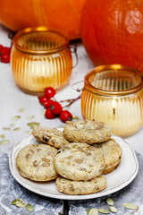 Pumpkin cookies in autumn setting