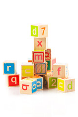 wooden toy cubes with letters. Wooden alphabet blocks.