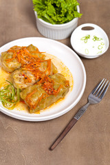Stuffed cabbage with tomato sauce