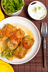 Stuffed cabbage on a white plate