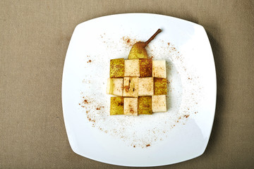 Pear in cubes pieces