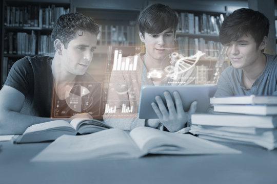 Serious young men studying medicine together with futuristic int