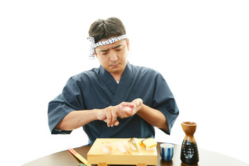 寿司を握る寿司職人