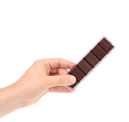 Hand hold two pieces of chocolate.