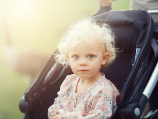 toddler in buggy
