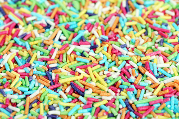 Fototapeta na wymiar Colored sugar sprinkles for food decoration.
