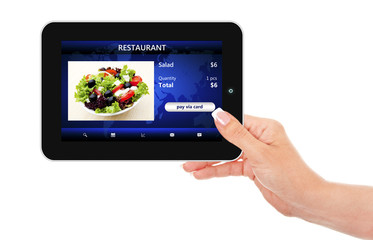 hand holding tablet with takeaway restaurant order screen