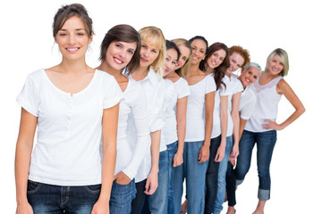 Obraz premium Casual models posing in a line looking at camera