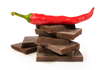 broken black chocolate with chili pepper