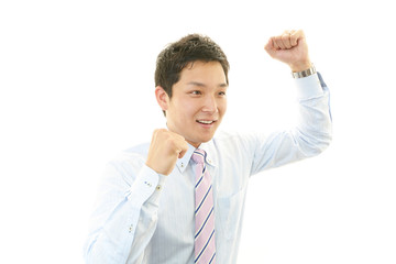 ガッツポーズのビジネスマン