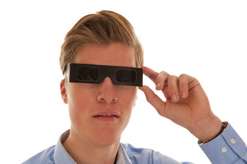 Boy looking through eclipse glasses