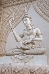 Thai angel statue depict play music