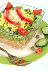 Tasty salad with fresh vegetables, isolated on white