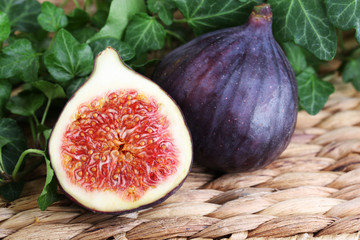 Ripe figs in leaves close-up