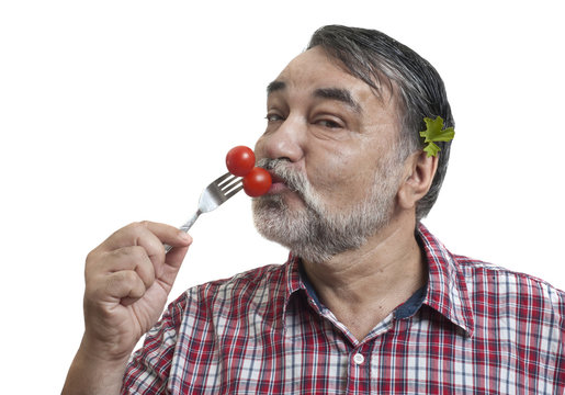 Man Eating Tomatoes