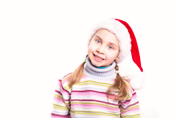 Fototapeta premium Cute little girl in Santa's hat
