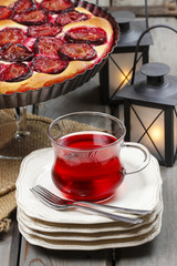 Glass of red juice on party table