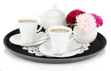 Cups of coffee on tray isolated on white